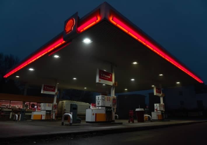 red and white store front during night time red and white store front during night time